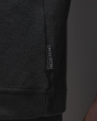 Man wearing AfterDark ZeroCrease Oversized Tee - Black | Model:Mabyro | Size:M | Thumbnail Index: 9