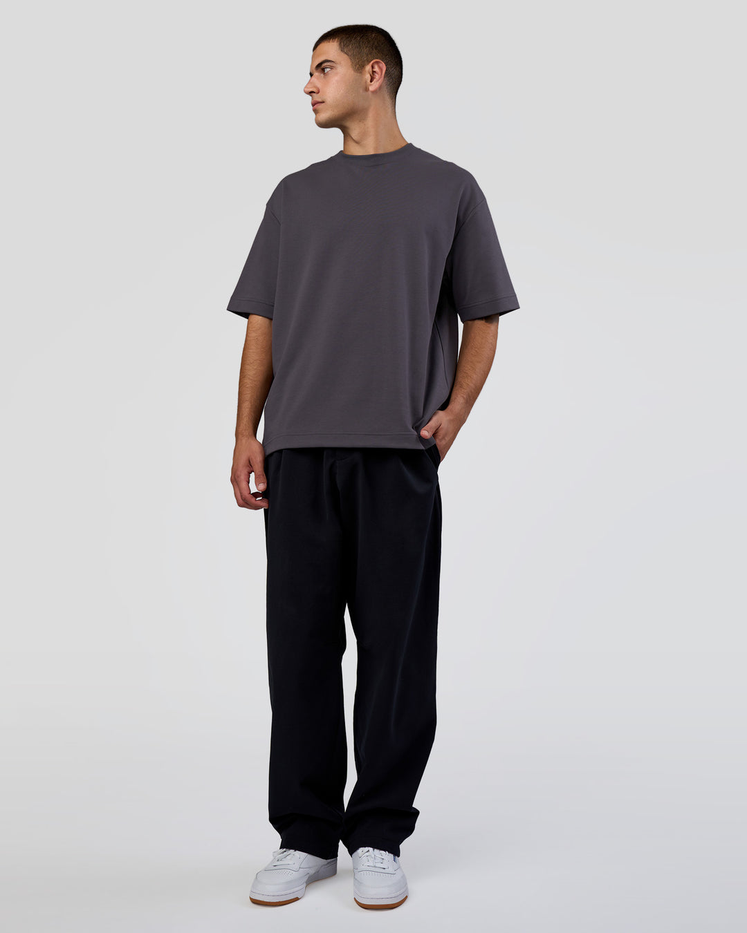 Man wearing AfterDark ZeroCrease Oversized Tee - Dark Storm | Model:Zoran | Size:M - view 10