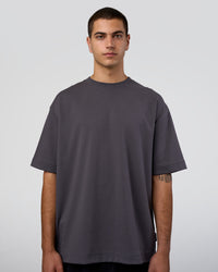 Man wearing AfterDark ZeroCrease Oversized Tee - Dark Storm | Model:Zoran | Size:M | Thumbnail Index: 1