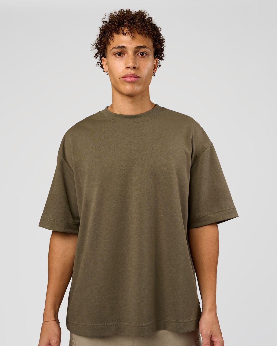 Man wearing AfterDark ZeroCrease Oversized Tee - Walnut Grey | Model:Leandro | Size:M - view 2