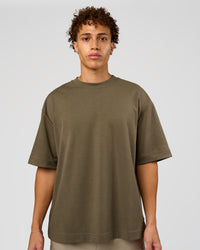 Man wearing AfterDark ZeroCrease Oversized Tee - Walnut Grey | Model:Leandro | Size:M | Thumbnail Index: 1