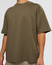 Man wearing AfterDark ZeroCrease Oversized Tee - Walnut Grey | Model:Leandro | Size:M | Thumbnail Index: 7