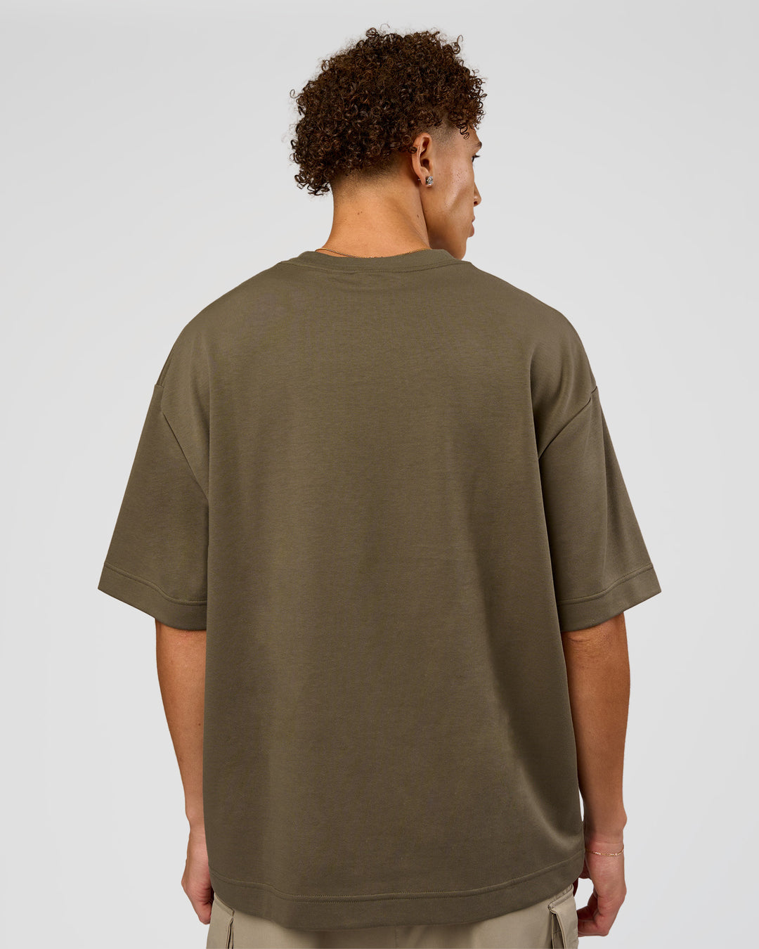 Man wearing AfterDark ZeroCrease Oversized Tee - Walnut Grey | Model:Leandro | Size:M - view 5