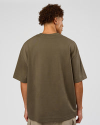 Man wearing AfterDark ZeroCrease Oversized Tee - Walnut Grey | Model:Leandro | Size:M | Thumbnail Index: 4