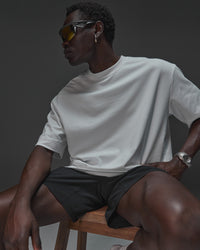Man wearing AfterDark ZeroCrease Oversized Tee - White | Model:Mabyro | Size:M | Thumbnail Index: 8