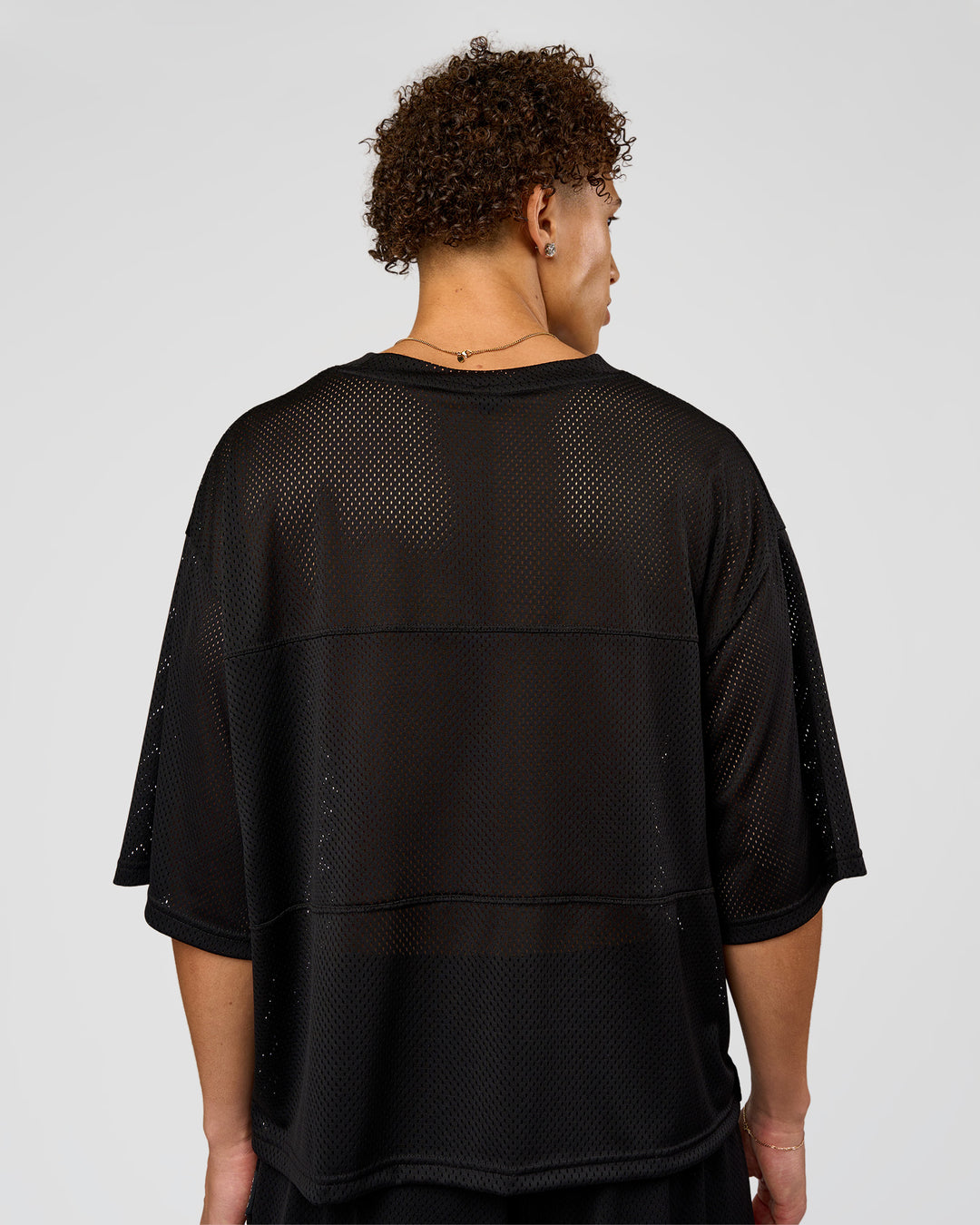 Man wearing AirCore Jersey - Black-Black | Model:Leandro | Size:M - view 6