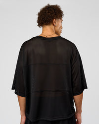 Man wearing AirCore Jersey - Black-Black | Model:Leandro | Size:M | Thumbnail Index: 5