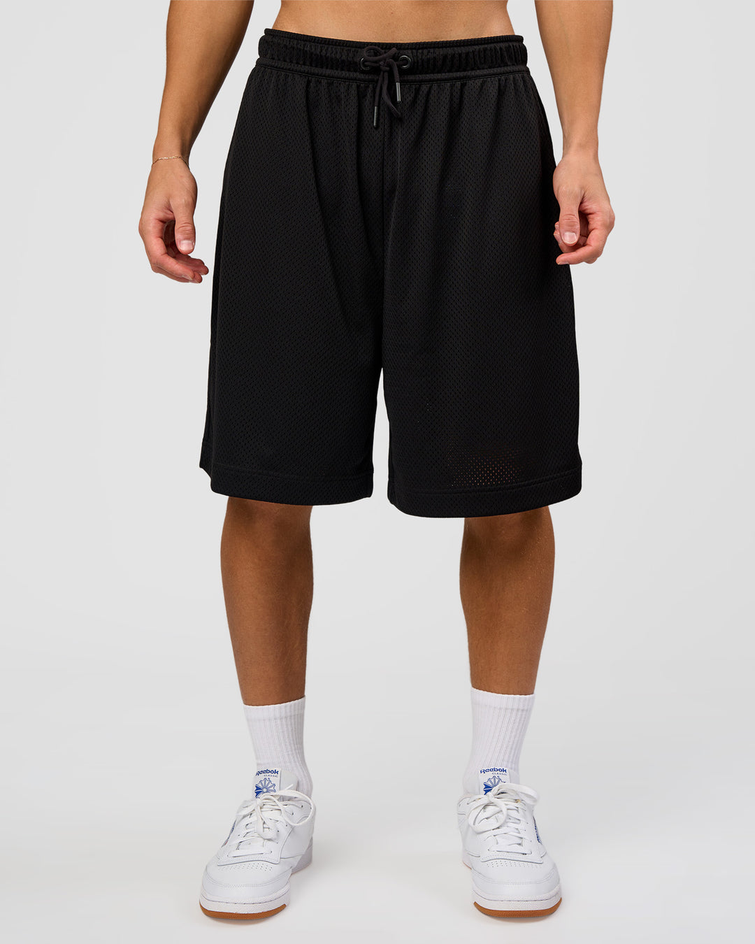 Man wearing AirCore Mesh 7" Short - Black | Model:Leandro | Size:M - view 6