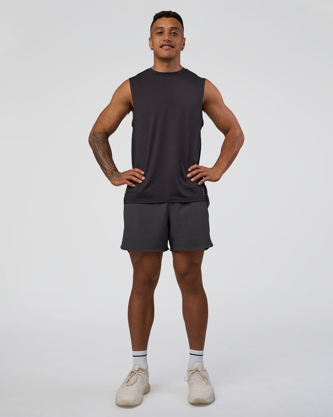 Man wearing AirTrack Muscle Tank - Black | Model:Daarian | Size:M - view 4