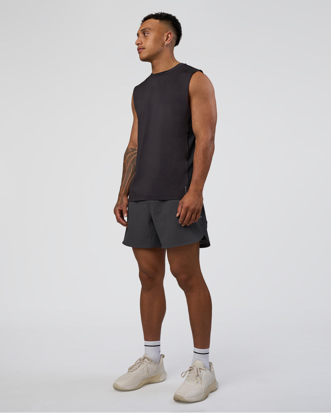 Man wearing AirTrack Muscle Tank - Black | Model:Daarian | Size:M - view 3