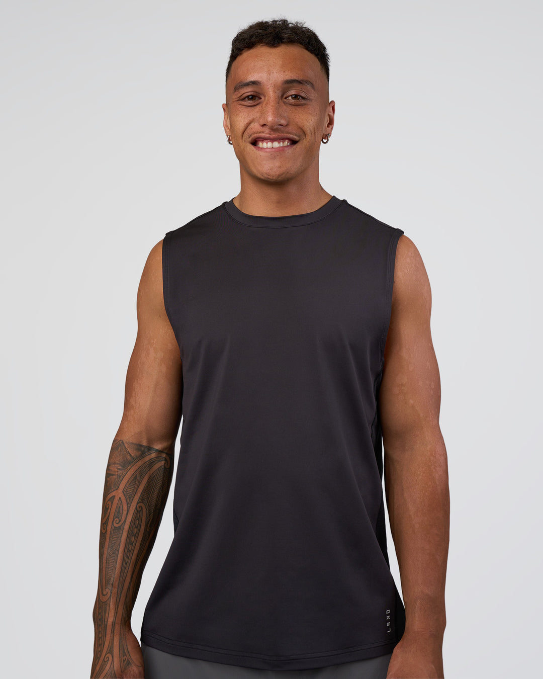Man wearing AirTrack Muscle Tank - Black | Model:Daarian | Size:M - view 1