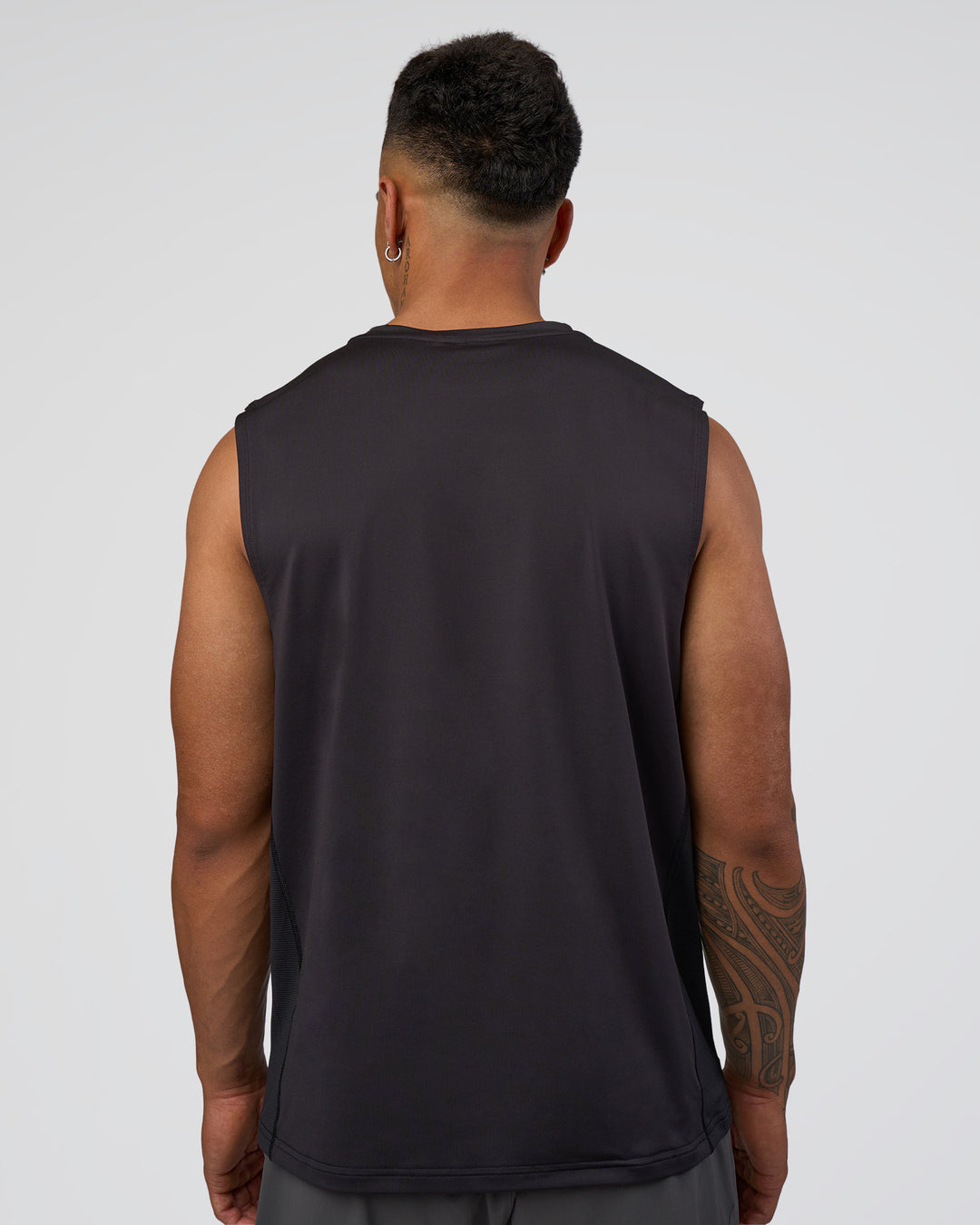 Man wearing AirTrack Muscle Tank - Black | Model:Daarian | Size:M - view 6