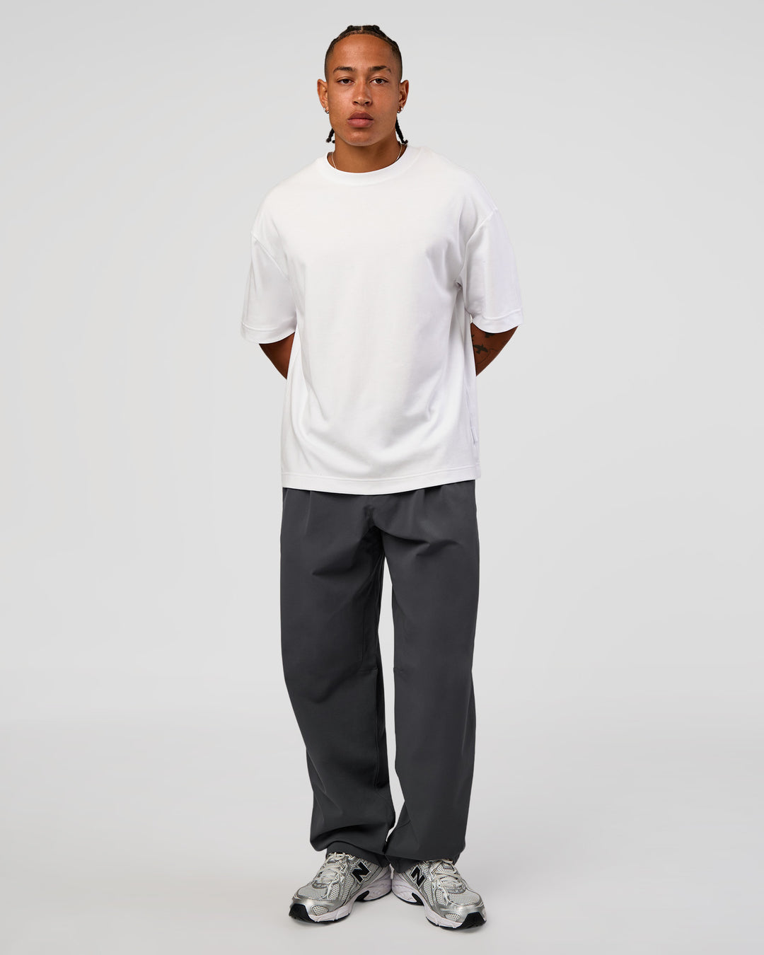 Man wearing All Day ZeroCrease™ Wide Leg Pant - Dark Storm | Model:Malebo | Size:M - view 8