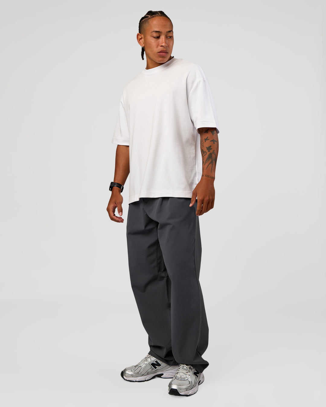 Man wearing All Day ZeroCrease™ Wide Leg Pant - Dark Storm | Model:Malebo | Size:M - view 6