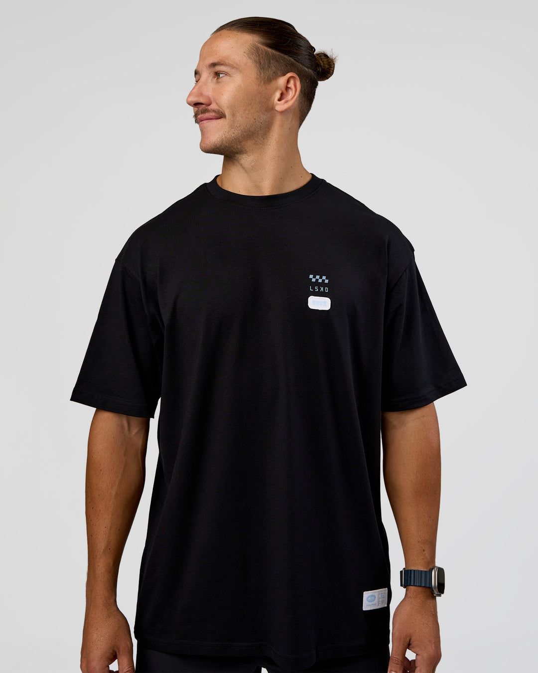 Man wearing Archive FLXCotton Oversized Tee - Black-Open Air | Model:Jaiden | Size:M - view 3