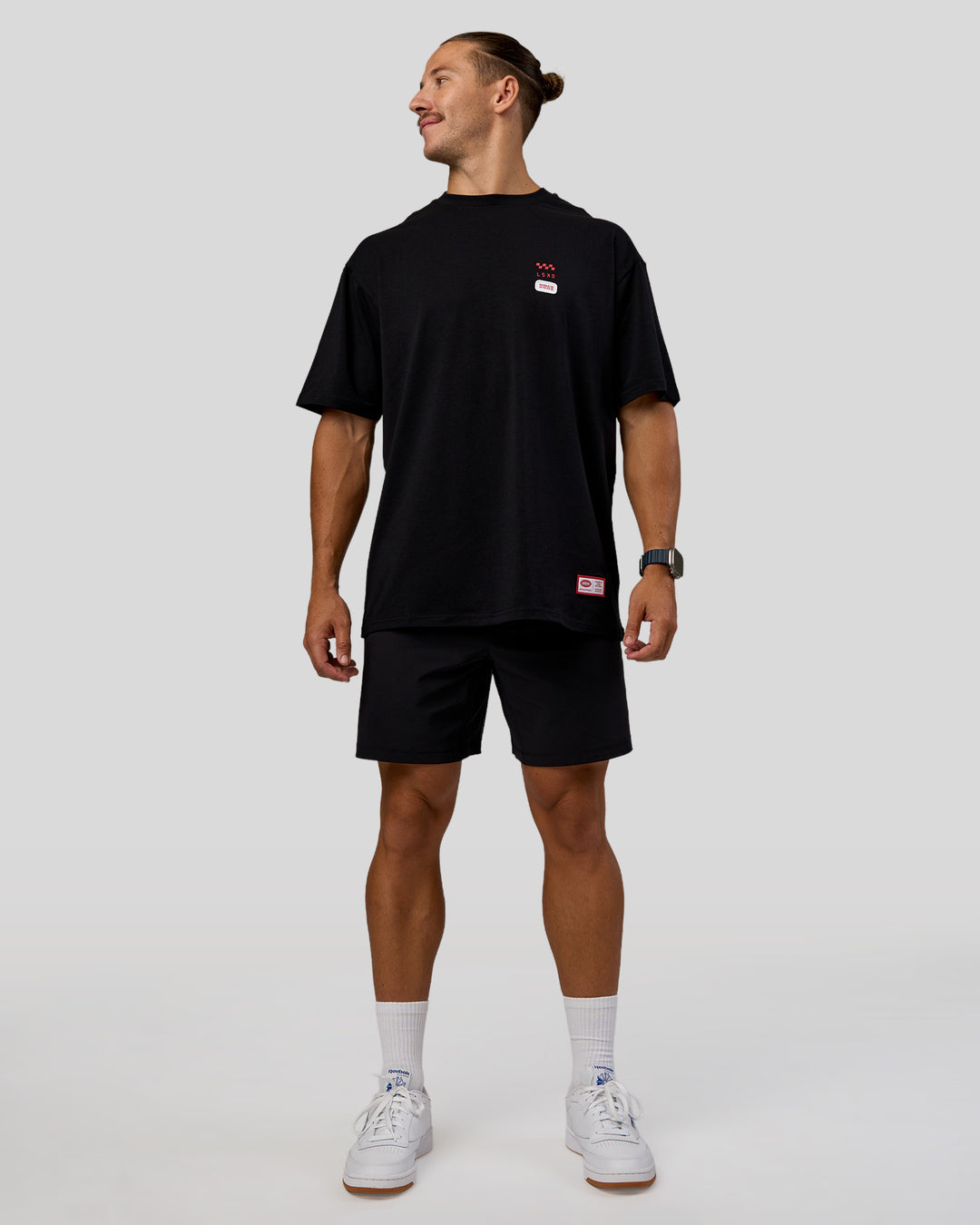 Man wearing Archive FLXCotton Oversized Tee - Black-Scarlet | Model:Jaiden | Size:M - view 10