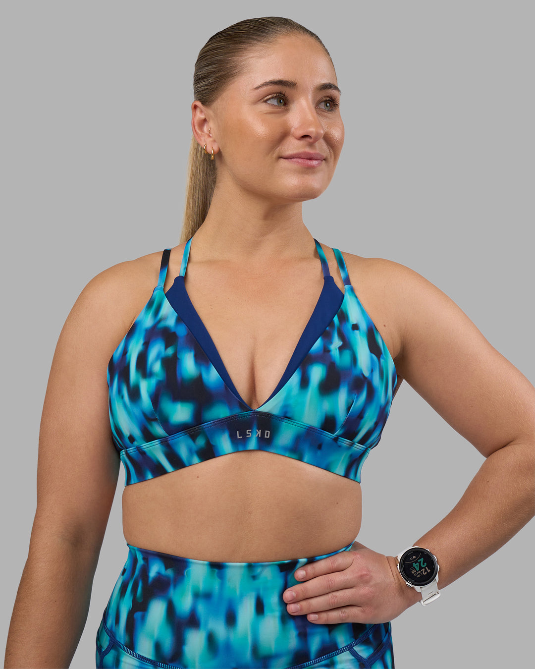Woman wearing Aria Triangle Sports Bra - Luminous | Model:Sami | Size:M - view 3