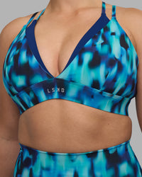 Woman wearing Aria Triangle Sports Bra - Luminous | Model:Sami | Size:M | Thumbnail Index: 5