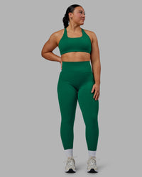 Woman wearing Aspire Sports Bra - Malachite | Thumbnail Index: 5