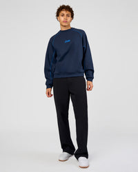 Man wearing Axis Boxy Crew Sweater - Future Navy-Palace Blue | Model:Leandro | Size:M | Thumbnail Index: 9