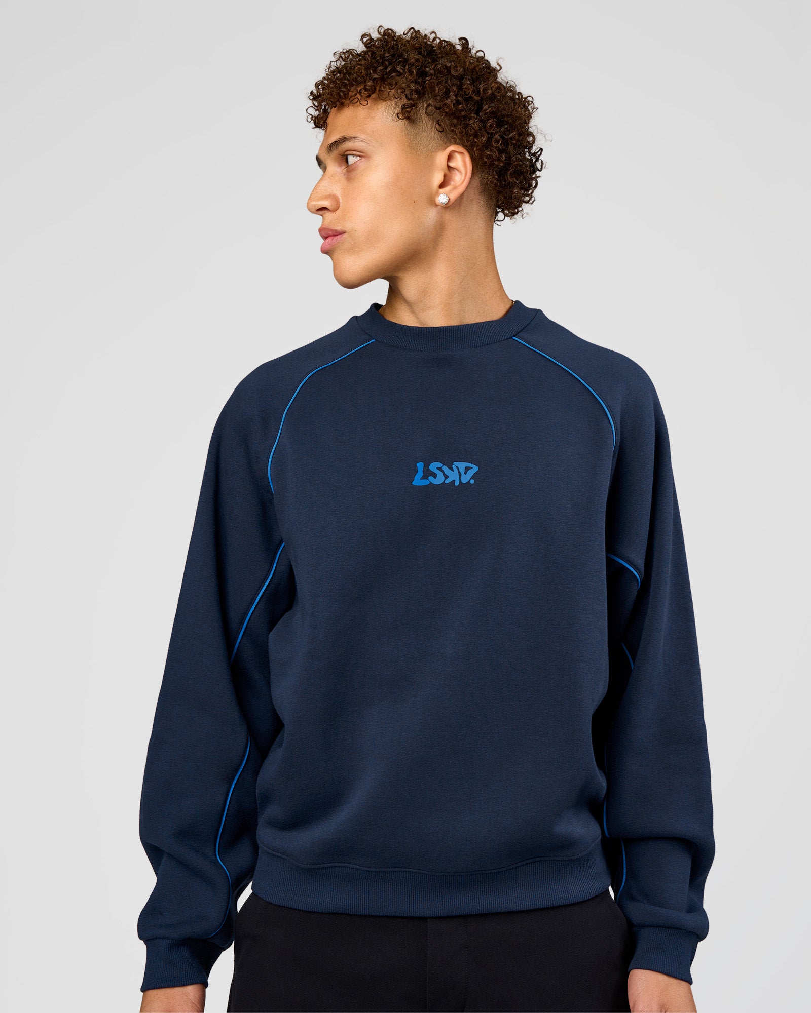 Man wearing Axis Boxy Crew Sweater - Future Navy-Palace Blue | Model:Leandro | Size:M