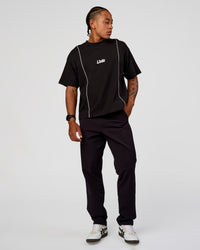 Man wearing Axis Heavyweight Oversized Boxed Tee - Black-White | Model:Malebo | Size:M | Thumbnail Index: 6