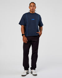 Man wearing Axis Heavyweight Oversized Boxed Tee - Future Navy-Palace Blue | Model:Malebo | Size:M | Thumbnail Index: 5