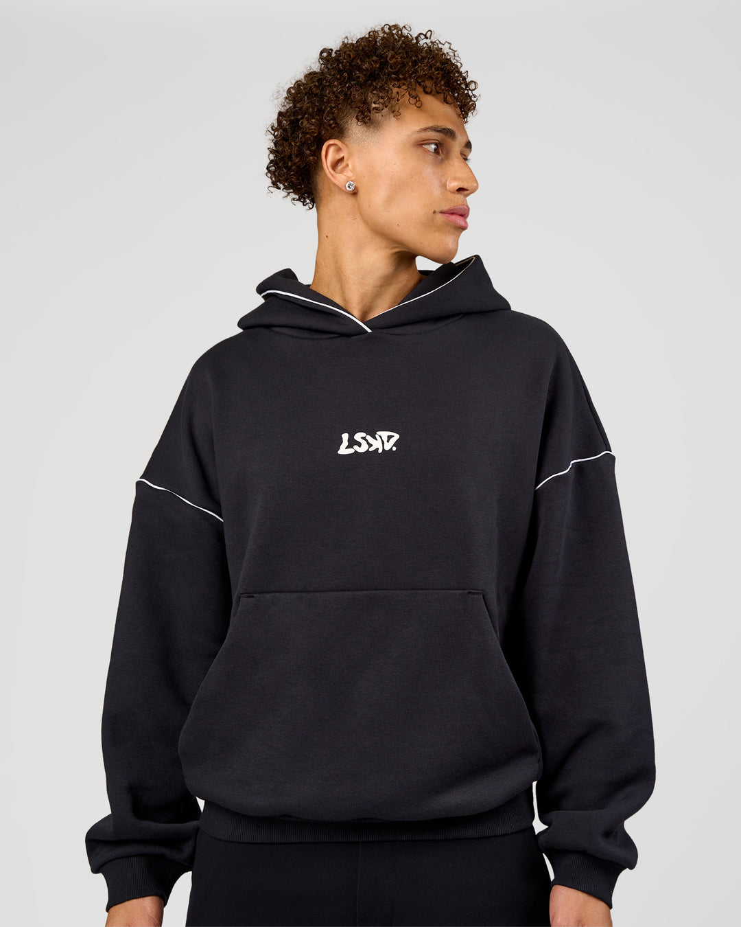 Man wearing Axis Oversized Hoodie - Caviar-White | Model:Leandro | Size:M - view 12