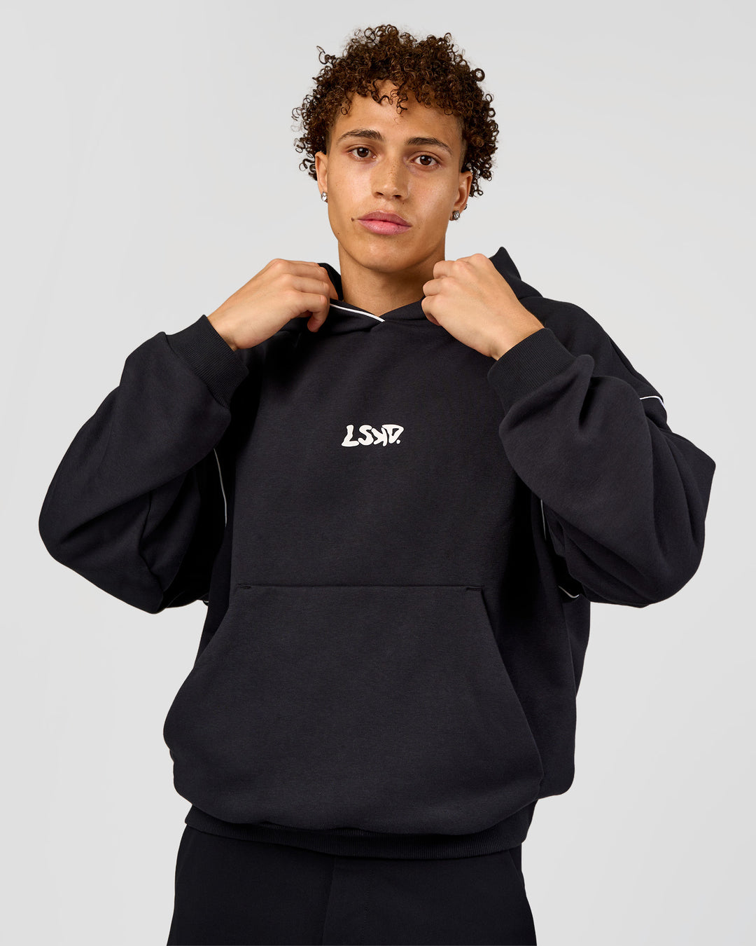 Man wearing Axis Oversized Hoodie - Caviar-White | Model:Leandro | Size:M - view 2