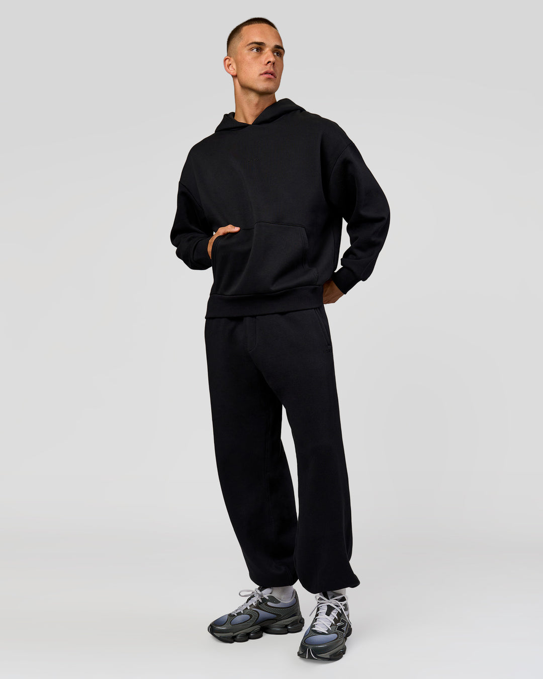 Man wearing Base Baggy Cuffed Track Pant - Black | Model:Albert | Size:M | - view 6
