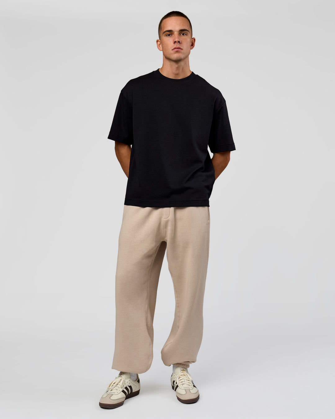 Man wearing Base Baggy Cuffed Track Pant - Shale Beige | Model:Albert | Size:M | - view 6