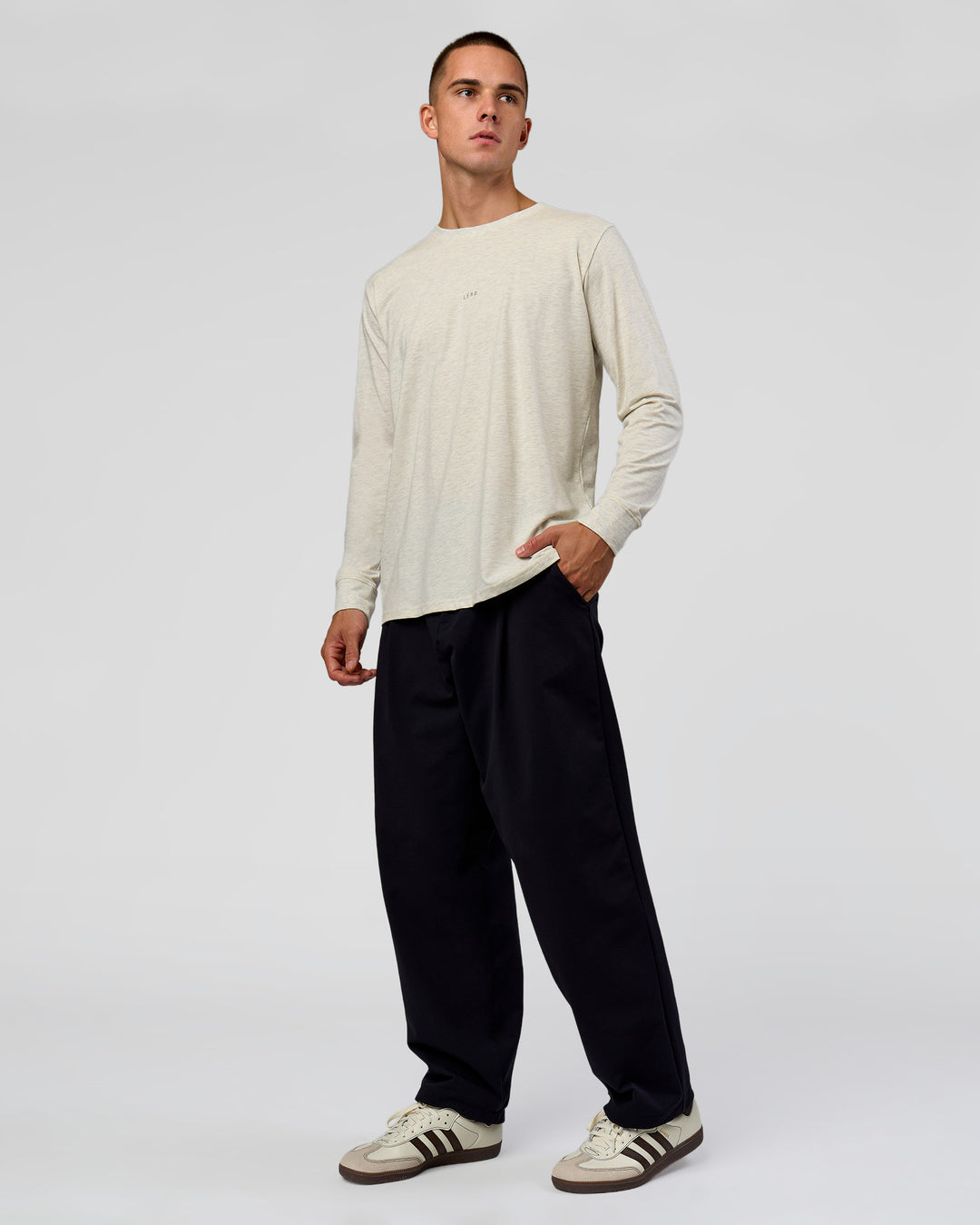 Man wearing Base FLXCotton Long Sleeve Tee in Silver Marl | Model:Albert | Size:M - view 4