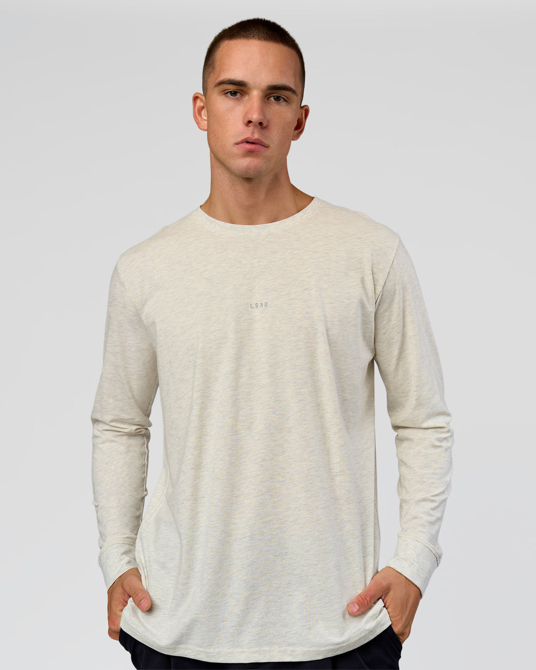 Man wearing Base FLXCotton Long Sleeve Tee in Silver Marl | Model:Albert | Size:M - view 1
