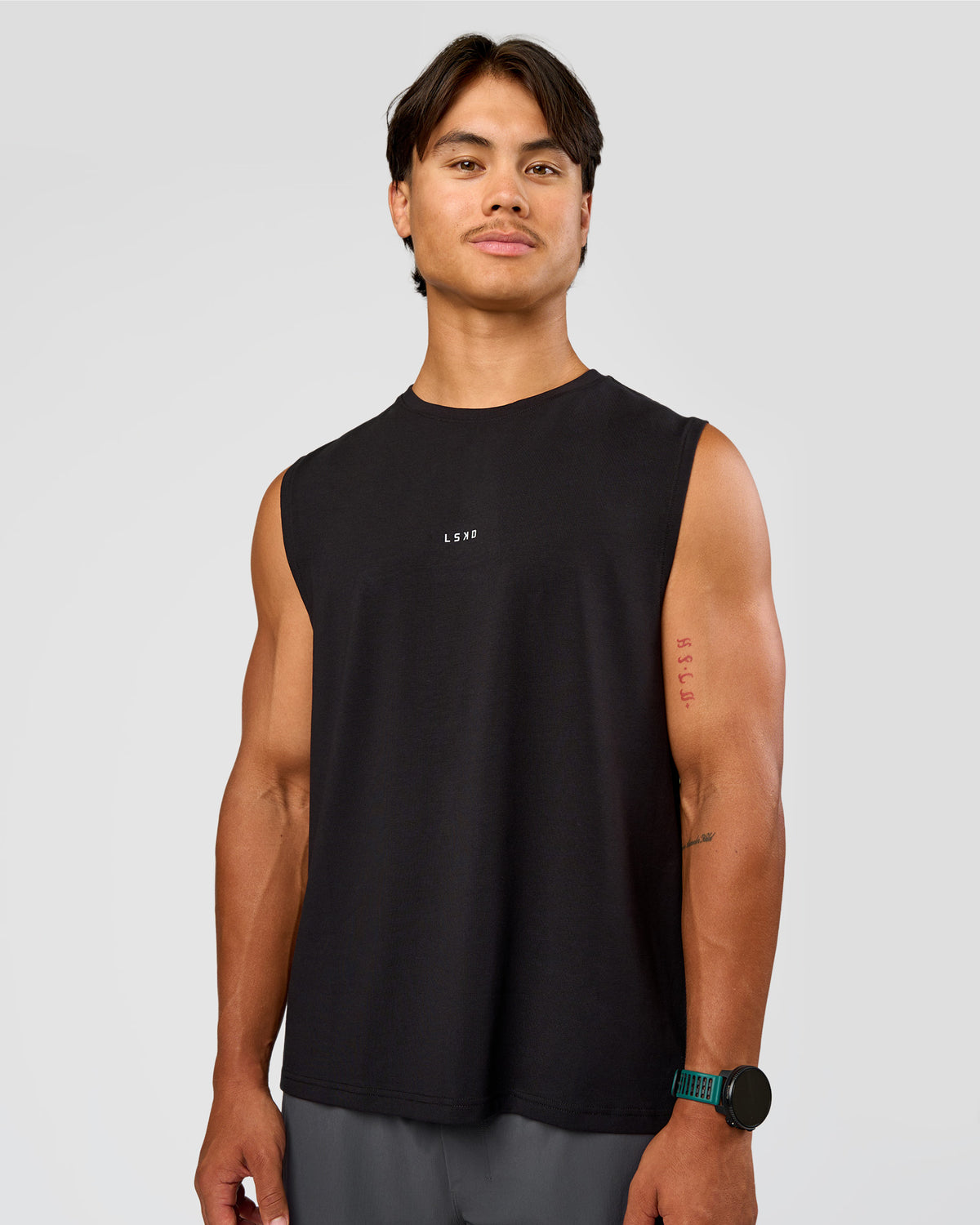 Man wearing Base FLXCotton Tank Regular Fit -8cm - Black | Model:George | Size:M