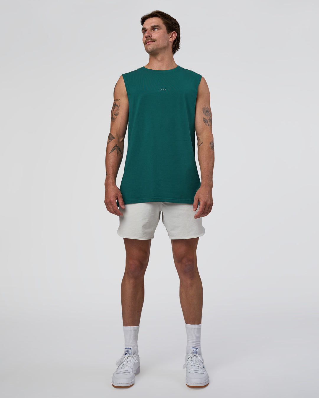 Man wearing Base FLXCotton Tank - Transformative Teal | Model:Konnor | Size:M - view 4