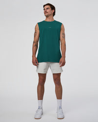 Man wearing Base FLXCotton Tank - Transformative Teal | Model:Konnor | Size:M | Thumbnail Index: 3