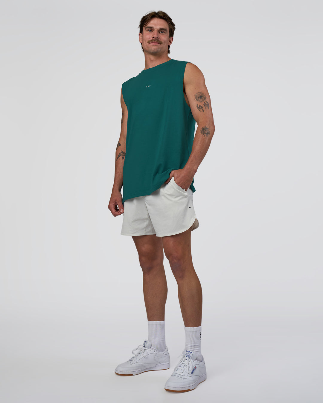 Man wearing Base FLXCotton Tank - Transformative Teal | Model:Konnor | Size:M - view 2