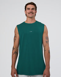Man wearing Base FLXCotton Tank - Transformative Teal | Model:Konnor | Size:M | Thumbnail Index: 0