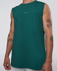 Man wearing Base FLXCotton Tank - Transformative Teal | Model:Konnor | Size:M | Thumbnail Index: 4