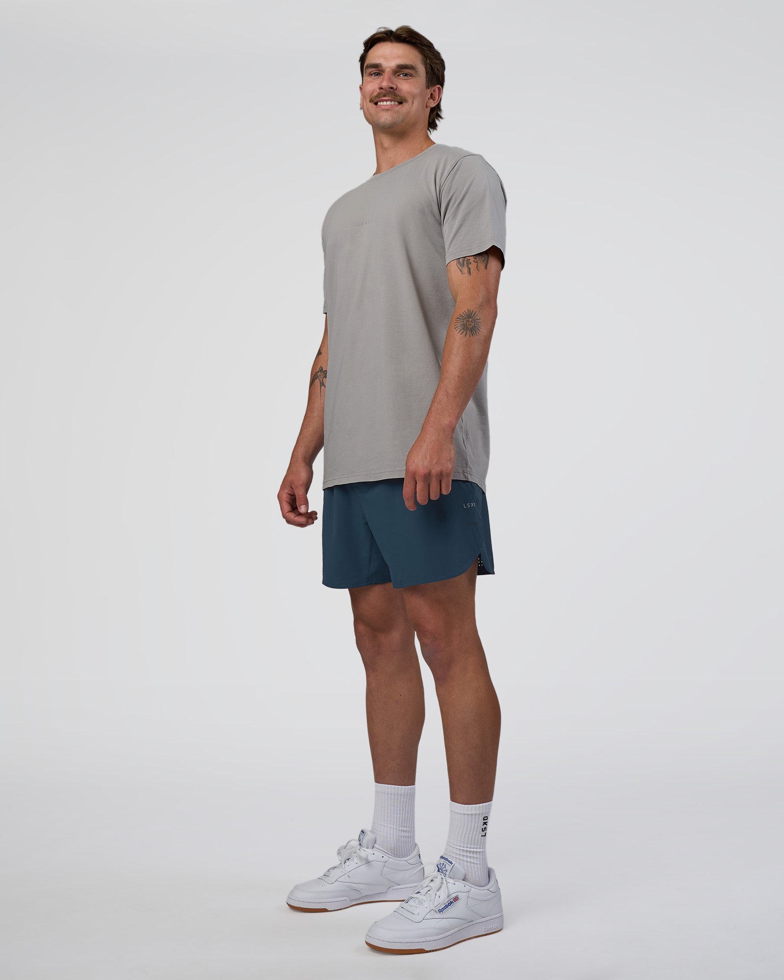 Man wearing Base FLXCotton Tee - Alloy Washed | Model:Konnor | Size:M