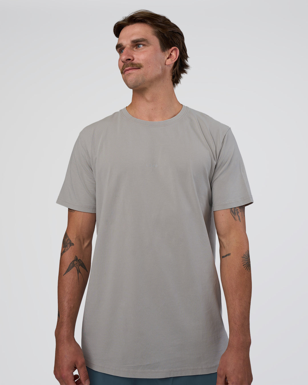 Man wearing Base FLXCotton Tee - Alloy Washed | Model:Konnor | Size:M - view 1