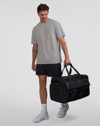 Man wearing Base FLXCotton Tee Oversized - Alloy Washed | Model:Konnor | Size:M | Thumbnail Index: 1