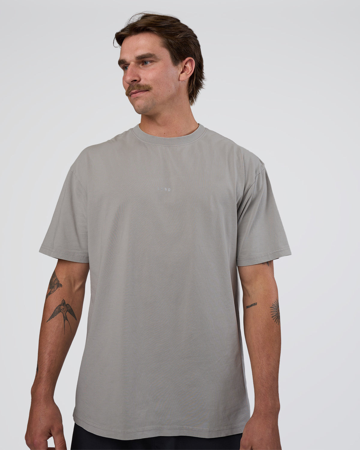 Man wearing Base FLXCotton Tee Oversized - Alloy Washed | Model:Konnor | Size:M
