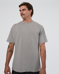 Man wearing Base FLXCotton Tee Oversized - Alloy Washed | Model:Konnor | Size:M | Thumbnail Index: 0