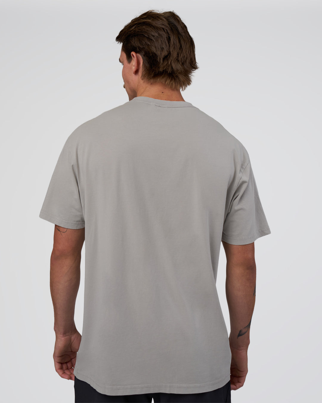 Man wearing Base FLXCotton Tee Oversized - Alloy Washed | Model:Konnor | Size:M - view 4