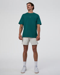 Man wearing Base FLXCotton Tee Oversized - Transformative Teal | Model:Konnor | Size:M | Thumbnail Index: 3