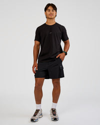 Man wearing Base FLXCotton Tee Regular Fit -8cm - Black | Model:George | Size:M | Thumbnail Index: 1