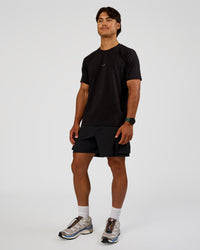 Man wearing Base FLXCotton Tee Regular Fit -8cm - Black | Model:George | Size:M | Thumbnail Index: 3