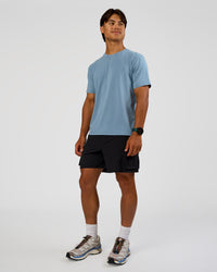 Man wearing Base FLXCotton Tee Regular Fit -8cm  - Elemental Blue Washed | Model:George | Size:M | Thumbnail Index: 4