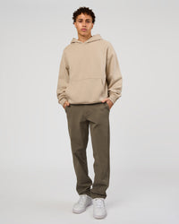 Man wearing Base Oversized Hoodie - Shale Beige | Model:Leandro | Size:M | | Thumbnail Index: 4
